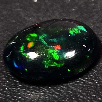 NATURAL AAA+ VALIOSO JUEGO DE COLORES OVALADO CABUCHAN ETÍOPE WELO ÓPALO NEGRO 1,70 CTS Foto 1 de 3