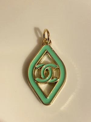 Dije de botón con cremallera (doble cara) Foto 1 de 3