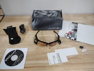 Oakley Thump Pro 512MB Sonnenbrille poliert schwarz mit bronzefarbenen Gläsern/Mp3-Player - Bild 1 von 4