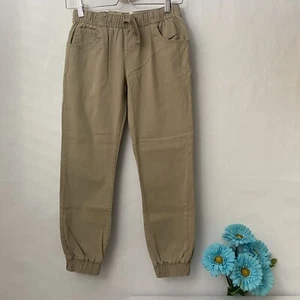 Pantalones de chándal ajustados con cordones de sarga LEVI'S para niños, beige caqui, talla M/10, nuevos con etiquetas. - Imagen 1 de 3