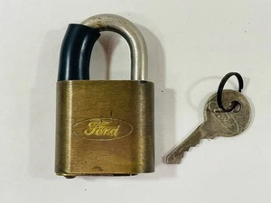 VINTAGE OVAL FORD SCRIPT BRASS PADLOCK W/ ORIGINAL FORD KEY - Picture 1 of 11