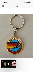 New AVIATOR NATION ENAMEL KEYCHAIN NEON RAINBOW STRIPES NEW JB - Picture 1 of 3