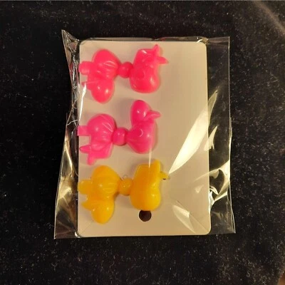 Vintage Barrettes Pink and Yellow Bows 1970s NEW Blacklight Glow Set - Image 1 of 2