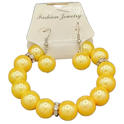 Conjunto de pulsera y pendientes de perlas de imitación amarillas de 7,5" con detalles de diamantes de imitación elásticos Foto 1 de 4