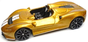 2022 HOT WHEELS MCLAREN ELVA GOLD 1:64 DIECAST 2 3/4" CAR WITH WHITE STRIPES - Picture 1 of 6