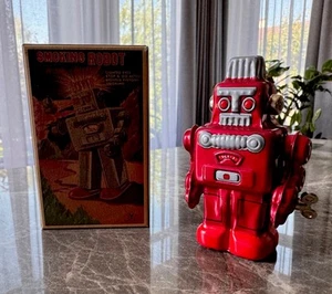Robot de hojalata estilo vintage cuerda fumar rojo mini juguete - Imagen 1 de 9