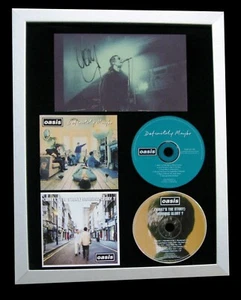 OASIS+LIAM GALLAGHER+FIRMADO+ENMARCADO+DEFINITIVAMENTE+HISTORIA=100% GENUINO+ENVÍO MUNDIAL RÁPIDO - Imagen 1 de 7