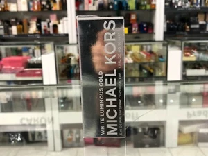 WHITE LUMINOUS GOLD DE MICHAEL KORS EAU DE PARFUM SPRAY 50 ML SELLADO DE LA COMPAÑÍA - Imagen 1 de 3