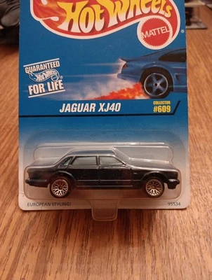 Jaguar XJ40 1997 Hot Wheels Collector #609 azul oscuro ruedas Mattel Foto 1 de 4
