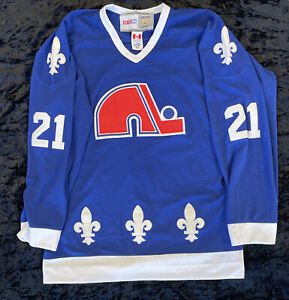 CCM Quebec Nordiques Peter Forsberg #21 NHL Blue Jersey Fight Strap