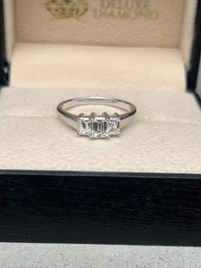 18ct W/G 0.69ct Three Emerald Cut Diamond Three Stone Ring, L1/2, Value £3000. - Picture 1 of 24