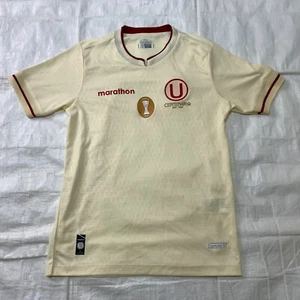Maglia 2024 Centenario MARATHON UNIVERSITARIO LIMA giovane taglia S 16" pit to pit - Foto 1 di 13