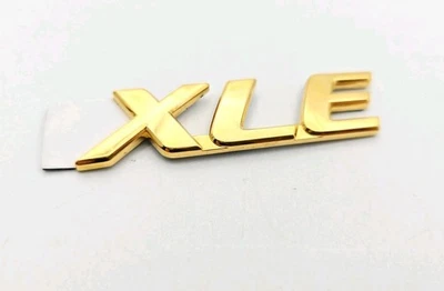 Toyota Sienna XLE 1998-2003 emblema trasero dorado logotipo insignia OEM Foto 1 de 3