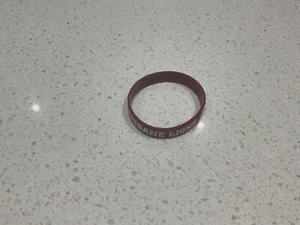Brisbane lions OFFICIAL RUBBER WRISTBAND,AFL FOOTBALL,BARGAIN,2 - Picture 1 of 2