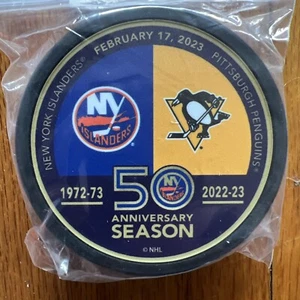 New York Islanders UBS Arena Puck vs Pittsburgh Penguins Feb 17, 2023 - Picture 1 of 2