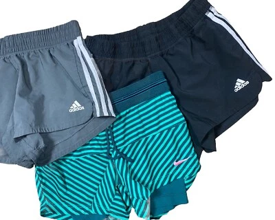 Lote feminino de 3 shorts esportivos de corrida tamanho XS Nike e Adidas verde cinza preto - Imagem 1 de 3
