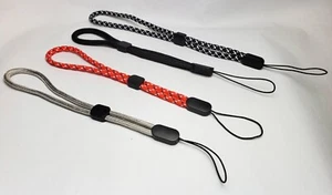 QUATRE (4) LANIÈRE DE BRACELET POUR CAMÉRAS, IPHONE, TÉLÉPHONE PORTABLE GOPRO ET USB - Photo 1 sur 1