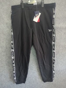 Pantalones de chándal grandes Reebok RI Tape para hombre pantalones negros pantalones de goma - Imagen 1 de 9