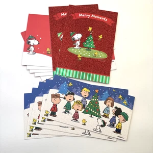 Lote de 7 tarjetas de Navidad Hallmark Peanuts Snoopy con 5 sobres de felicitación navideña - Imagen 1 de 9