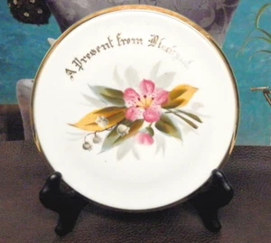 "Soporte de tetera de porcelana de recuerdo vintage trivet Blackpool Austria 6,5" - Imagen 1 de 4