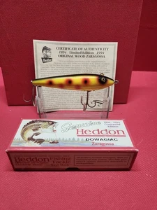 1994 NUEVO Señuelo de pesca Heddon Dowagiac Zaragoza amarillo con ojos de vidrio - Imagen 1 de 20