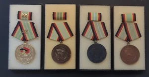 4 DDR  Medaillen für treue Dienste in der Grenze  1.Satz - Bild 1 von 1