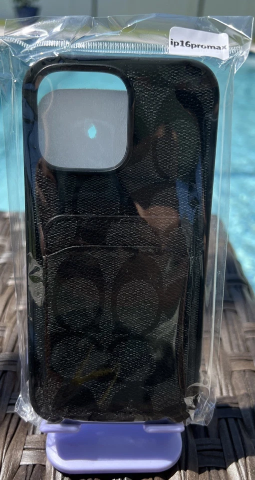 Luxurious Outlet Designer Black Signature Wallet Case for iPhone 16 Pro Max! - Image 1 of 1