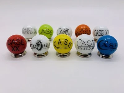 10 Case XX KNIFE/KNIVES Advertising 3/4 Inch Glass Shooter Marbles & Stands. - Image 1 of 4