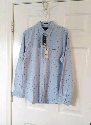 US Polo Assn. Camisa abotonada manga larga para hombre talla mediana calce ajustado azul claro  Foto 1 de 4