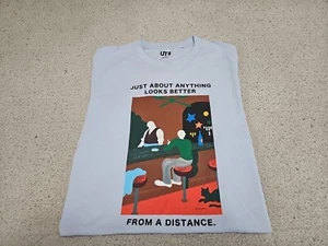 UNIQLO Haruki Murakami JUST ABOUT ANYTHING LOOKS BETTER FROM A DISTANCE Tshirt S - Picture 1 of 9