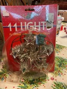 NUEVO DE COLECCIÓN 1990 Silver Tinsel Star 11 Luz Intermitente Árbol de Navidad Topper Aurora - Imagen 1 de 9