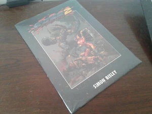 Portafoglio sigillato Simon Bisley Limited firmato Fakk2 metallo pesante - Foto 1 di 5