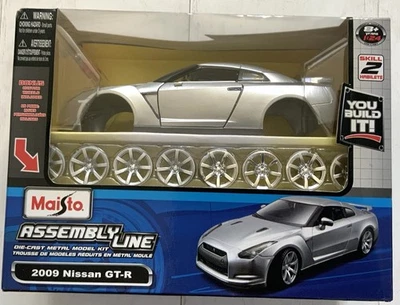 Maisto Línea de Montaje Die Cast Model Kit 2009 Nissan GT-R 1:24 Plateado Sellado Nuevo Foto 1 de 4