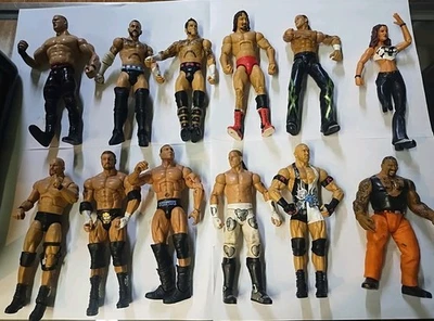 Lote de 12 figuras WWE Mattel, Jakks CM Punk, Stone Cold, mal estado Foto 1 de 3