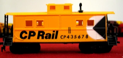 HO Scale CP Rail CP435678 Yellow Caboose w/ Smoke stack. - Image 1 of 4
