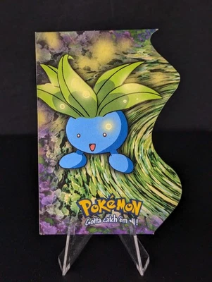 Oddish EV4 of 12 - Die Cut - Pokemon Topps Series 2 - Image 1 of 4