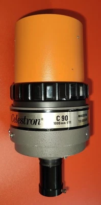 Lente espejo Celestron C90 1000 mm f/11 para réflex digitales en naranja  Foto 1 de 4