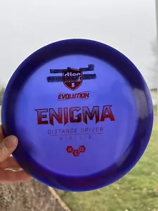Disco de golf DiscMania Evolution Neo Enigma 172 g rojo púrpura controlador de distancia usado - Imagen 1 de 4