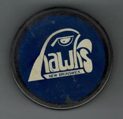 GAME PUCK - AHL NEW BRUNSWICK HAWKS BLUE Front Orange Back 1978-79 - #nitro99 - Image 1 of 2