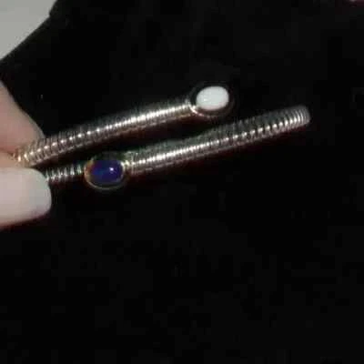 BRACCIALE TUBOGAS 2 GIRI IN ARGENTO E RIFINITURE IN ORO E PIETRE DURE - Immagine 1 di 4