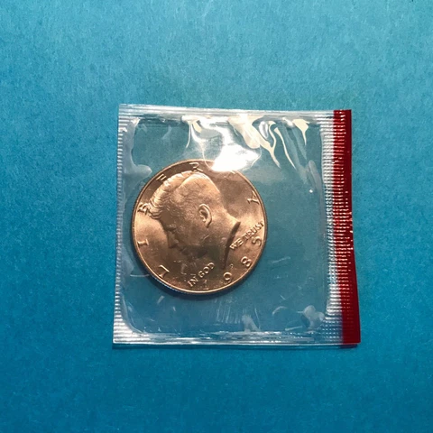 1985 D Kennedy Half Dollar  In US Mint Cello  FREE SHIP Cover