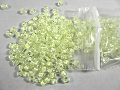 125 Miyuki Transparent Color-Lined Clear & Neon Green Glass TRIANGLE BEADS - Image 1 of 2
