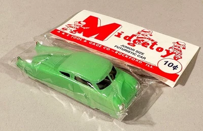 VINTAGE MIDGETOY Diecast Futuristic Car Green 3.5" Original package - Image 1 of 2