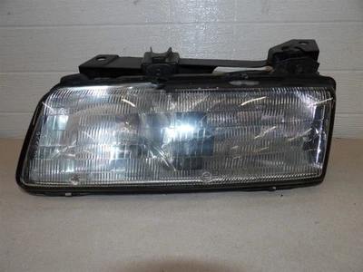 PONTIAC GRAND AM 1989-1991 LH DRIVERS SIDE HEADLIGHT W/ MOUNTING BRACKET OEM - Image 1 of 4