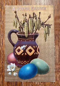 Lila Krug EIER rot grün blau OSTERN Antik Vintage Gold EMB Postkarte! - Bild 1 von 2