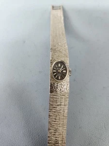 Reloj mecánico vintage Austin 17j cuerda elegante para damas tono plateado funciona - Imagen 1 de 8