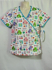 NWTS CARE BEARS CHEROKEE TOONIFORMS V NECK SCRUB TOP SMALL PROUD TO CARE - PEACE - Picture 1 of 7