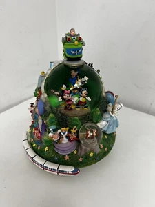 DISNEY FOUR PARKS ONE WORLD MONOROTAIA MUSICAL GLOBO NEVE LEGGI - Foto 1 di 11