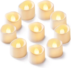 12 candele a batteria tremolanti luci da tè LED senza fiamma 200+ore - Foto 1 di 12