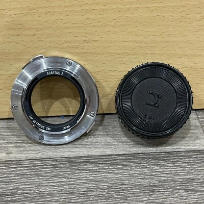 Tamron Adaptall 2 Adapter for Olympus OM Cameras Vintage Photography Cap - Image 1 of 4